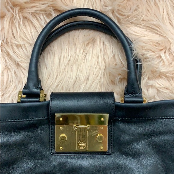 Tory Burch Handbags - Tory Burch purse black leather gold details large